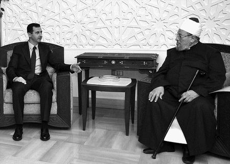 Юсуф аль-Кардави с президентом Сирии Башар Асадом